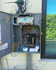 Open Jandy Aqualink RS automation panel with wiring
